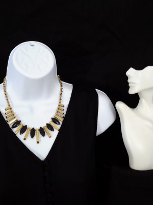 Gold barred hematite with black glass beads