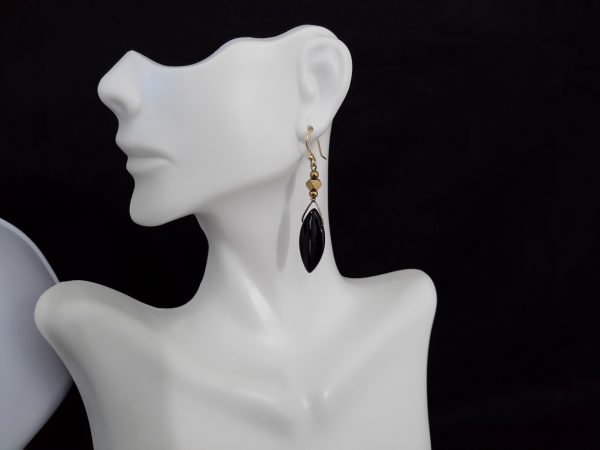 Gold barred hematite with black glass beads